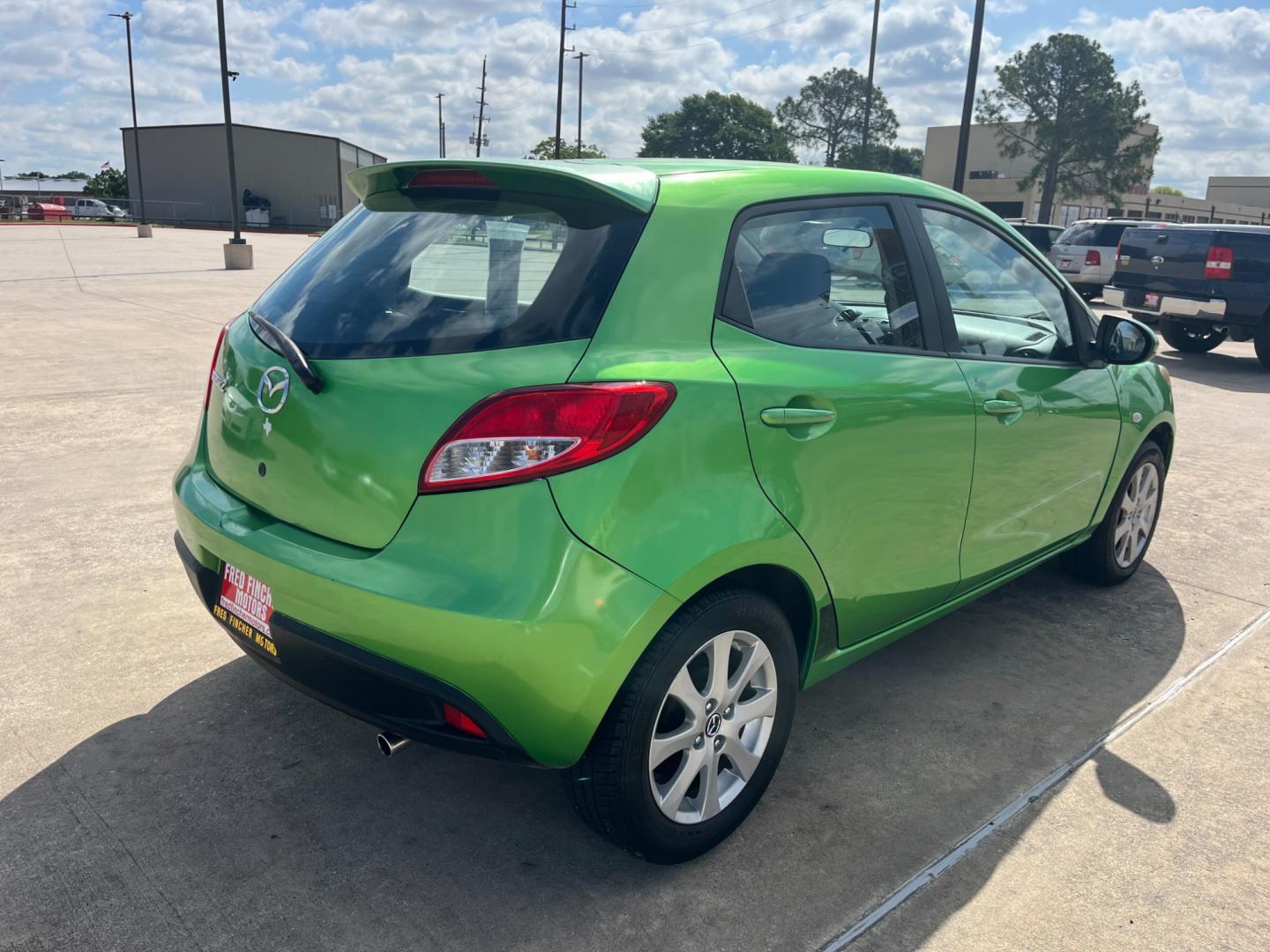 2013 green /black Mazda MAZDA2 Touring (JM1DE1LY1D0) with an 1.5L L4 DOHC 16V engine, Automatic transmission, located at 14700 Tomball Parkway 249, Houston, TX, 77086, (281) 444-2200, 29.928619, -95.504074 - Photo#6